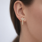 18K Yellow Gold Diamond Star Huggie Earrings – model edit