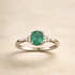 Diamond and emerald ring. – front edit