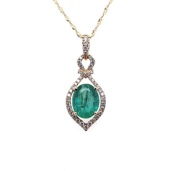 Ladies diamond and oval emerald necklace