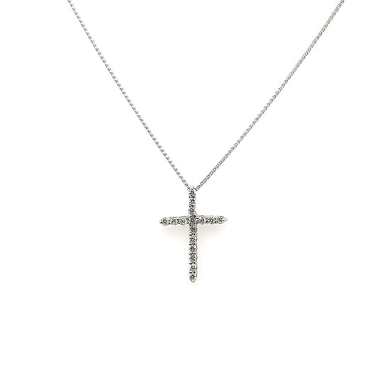 Dainty diamond cross with chain.